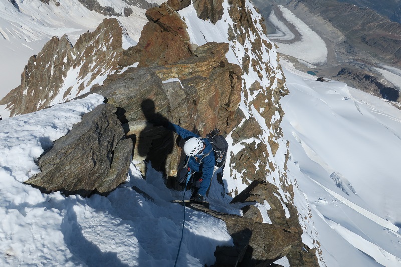Near the top, with the track on the glacier visible far below