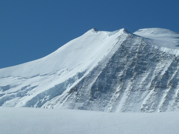 Tiny skiers below the Bishorn North face